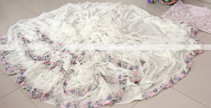 White georgette fancy thread and miror work ruffle saree