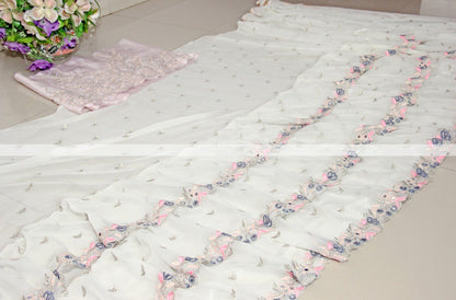 White georgette fancy thread and miror work ruffle saree