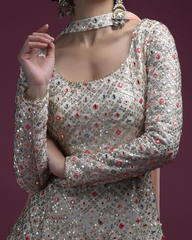 White georgette heavy embroidered sharara suit