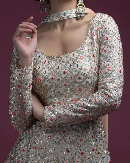 White georgette heavy embroidered sharara suit