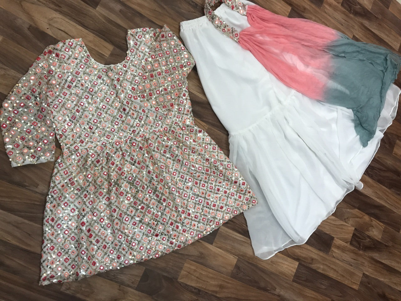 White georgette heavy embroidered sharara suit