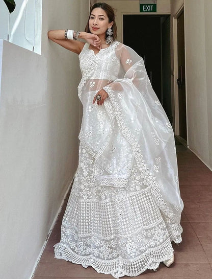 White georgette heavy embroidered wedding lehenga choli