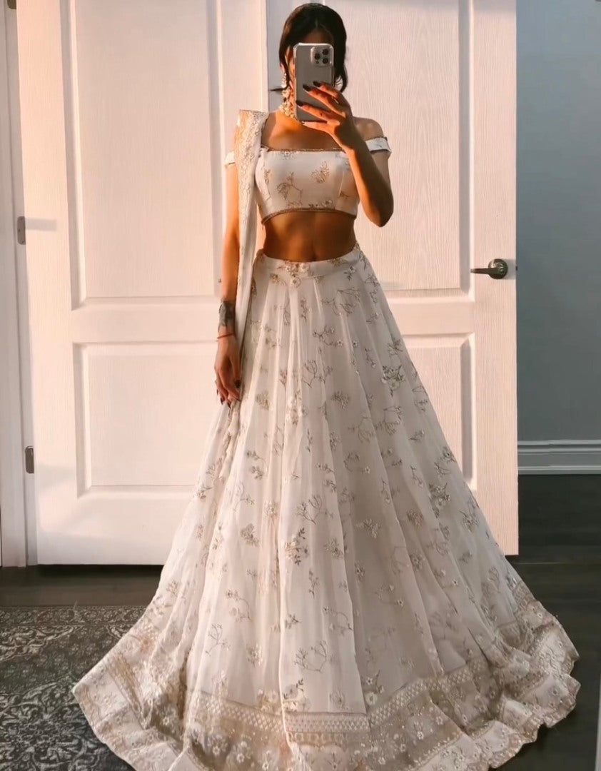 White georgette heavy embroidery work lehenga for ceremony