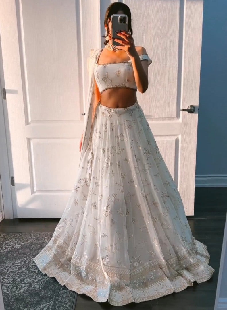 White georgette heavy embroidery work lehenga for ceremony