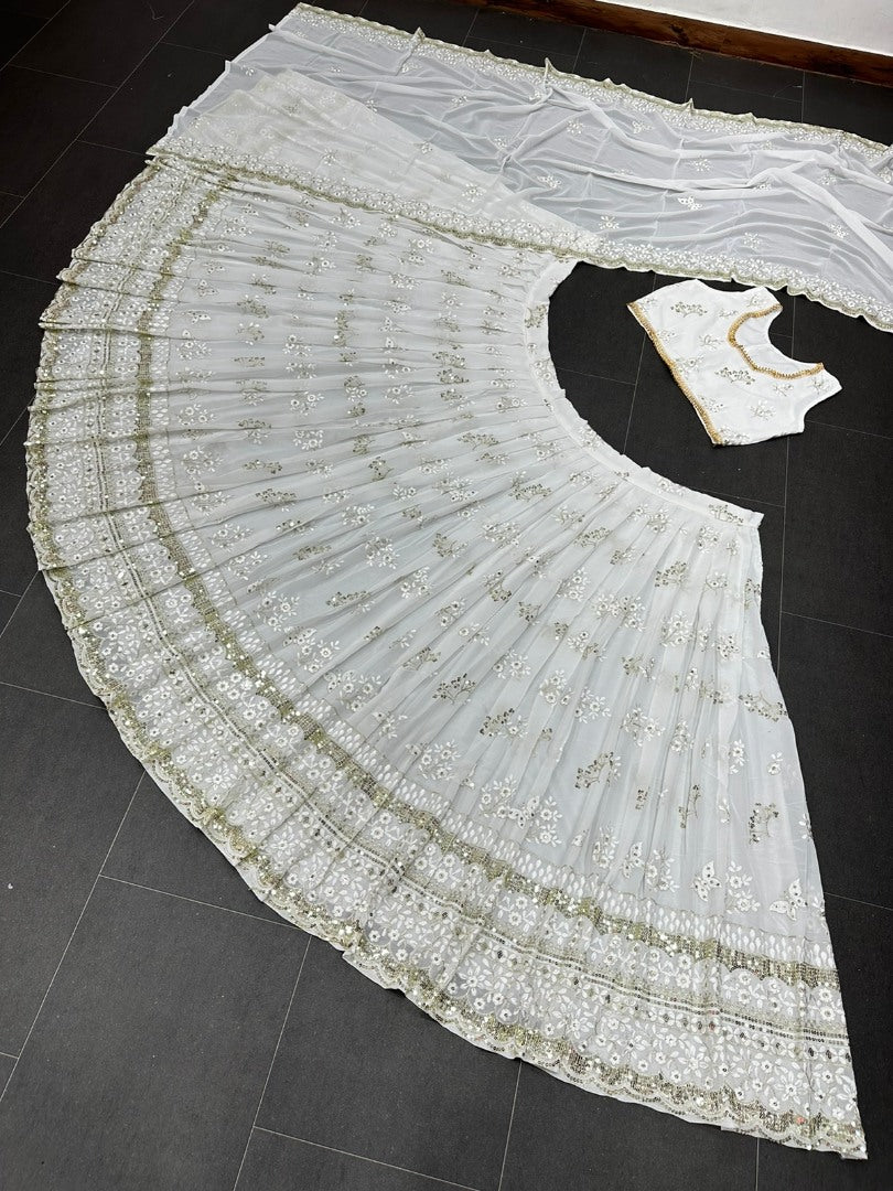 White georgette heavy embroidery work lehenga for ceremony