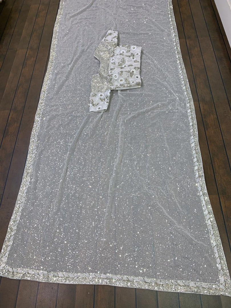 White georgette heavy sequence worked ceremonial saree