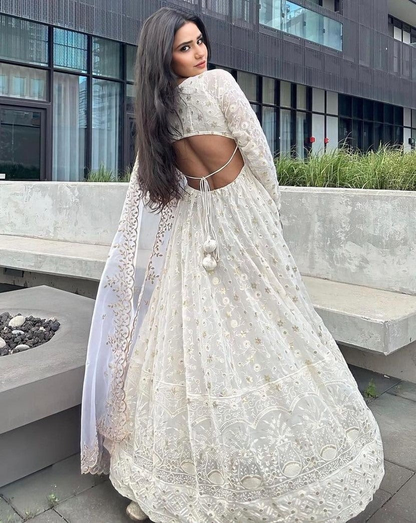 White georgette heavy thread sequence work gown for ceremony