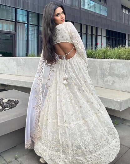 White georgette heavy thread sequence work gown for ceremony