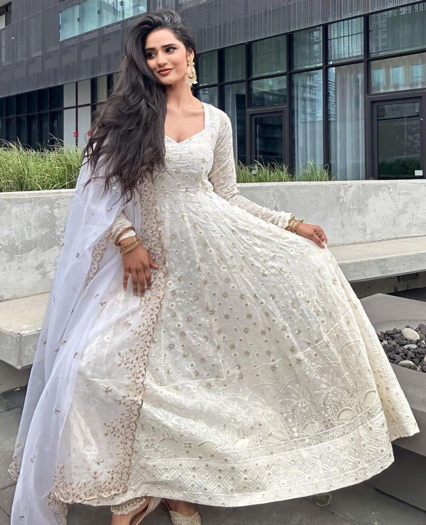 White georgette heavy thread sequence work gown for ceremony