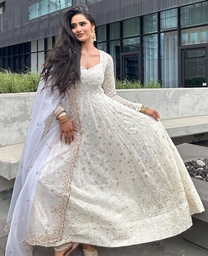 White georgette heavy thread sequence work gown for ceremony