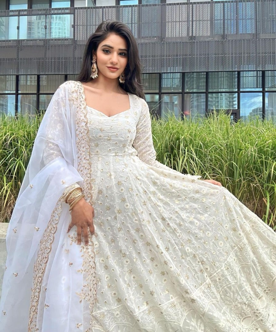 White georgette heavy thread sequence work gown for ceremony