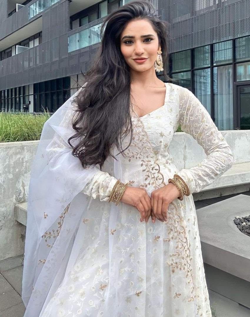 White georgette heavy thread sequence work gown for ceremony