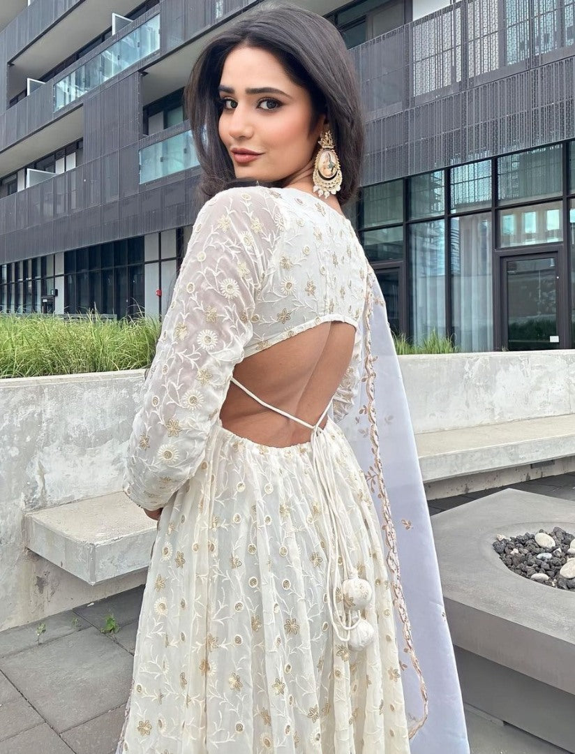 White georgette heavy thread sequence work gown for ceremony