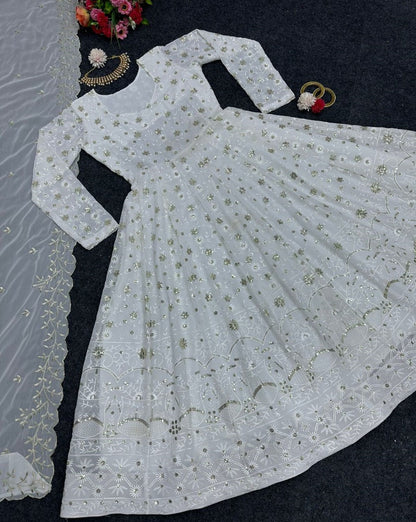 White georgette heavy thread sequence work gown for ceremony