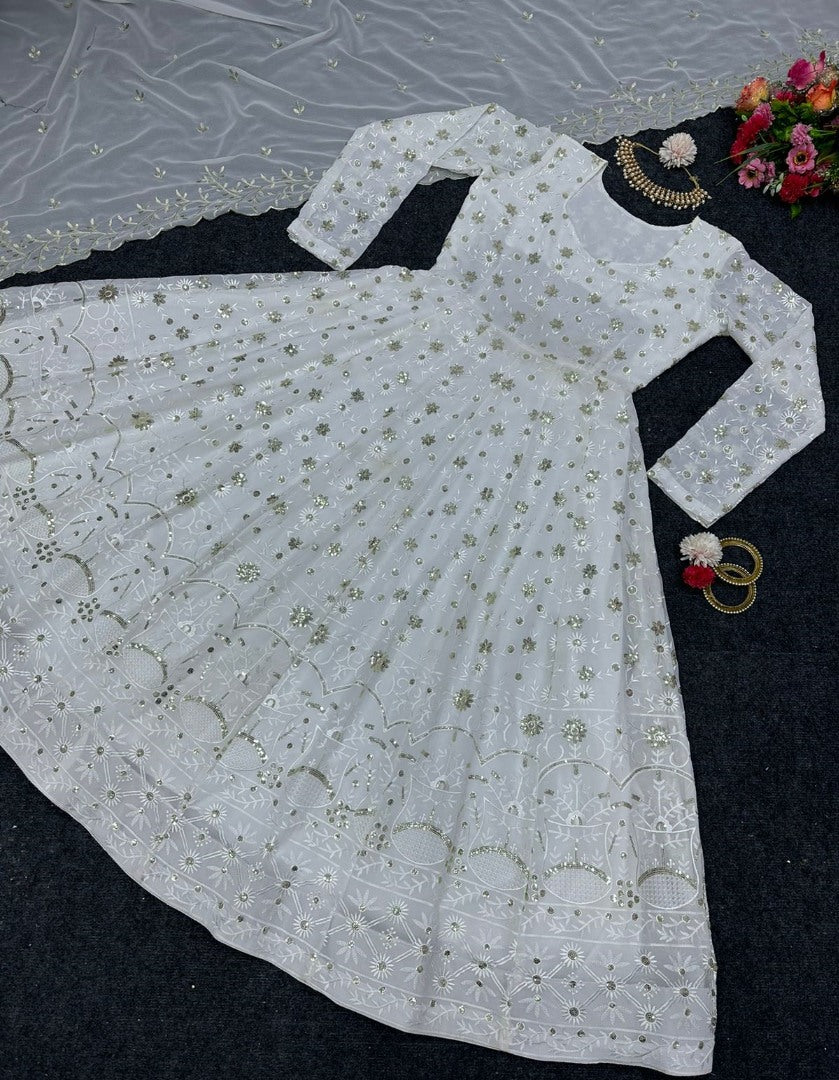 White georgette heavy thread sequence work gown for ceremony