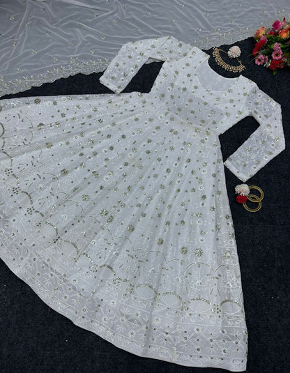 White georgette heavy thread sequence work gown for ceremony