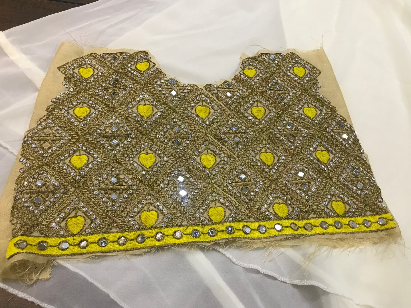 White georgette lehenga with mirror work shrug and blouse