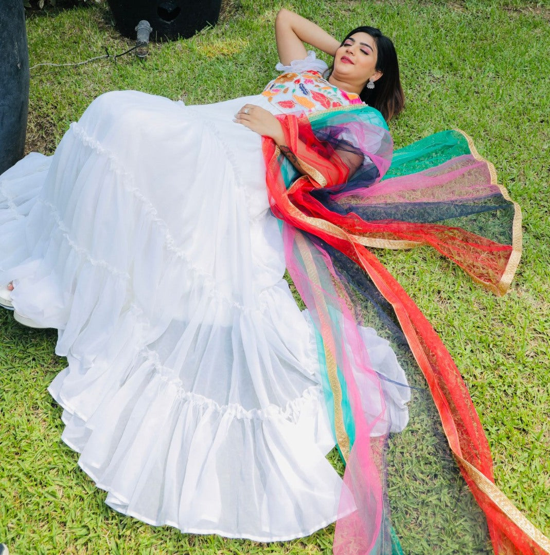 White georgette multi thread embroidered ruffle flair gown