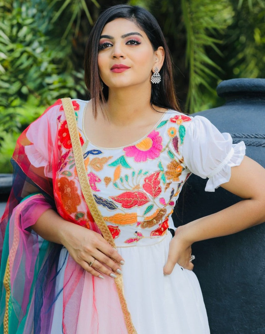 White georgette multi thread embroidered ruffle flair gown