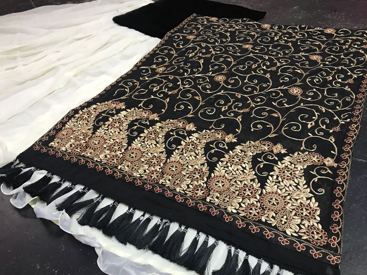 White georgette partywear lehenga with heavy embroidered dupatta