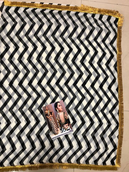 White georgette print partywear saree with embroidered blouse