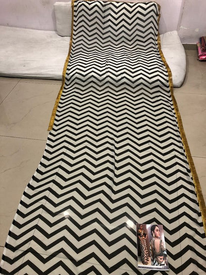 White georgette print partywear saree with embroidered blouse