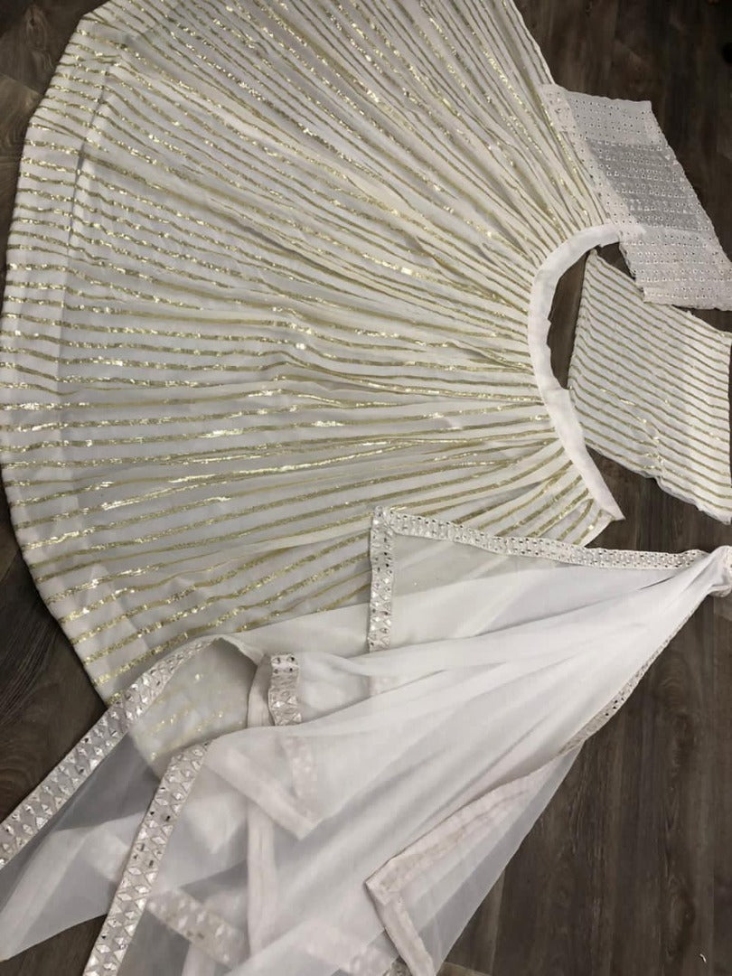 White georgette sequence work lehenga choli