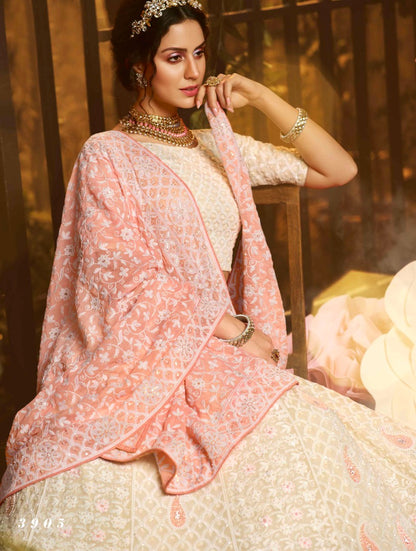 White georgette thread sequence and ruffle work bridal lehenga choli