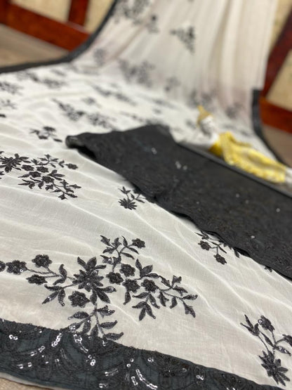White georgette with sequence work party wear saree