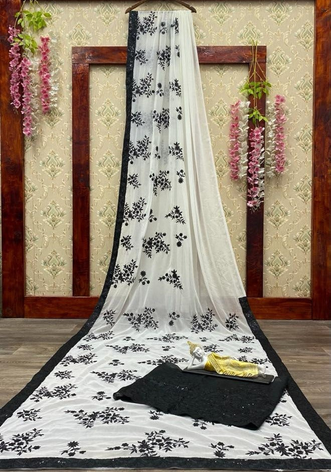White georgette with sequence work party wear saree