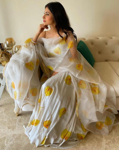 White georgette yellow leaves printed anarkali gown