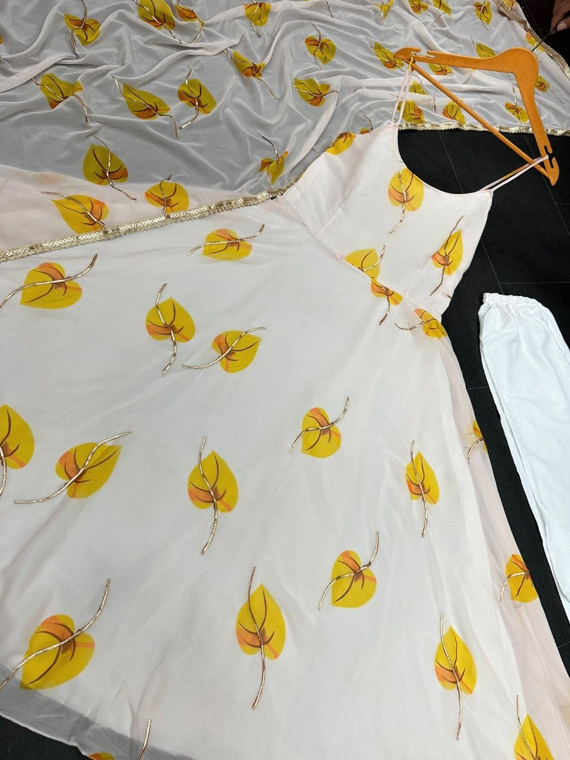 White georgette yellow leaves printed anarkali gown