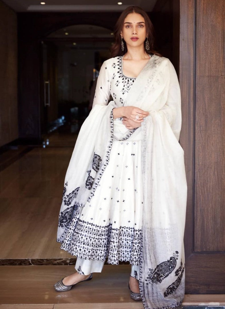 White heavy embroidery work anarkali suit