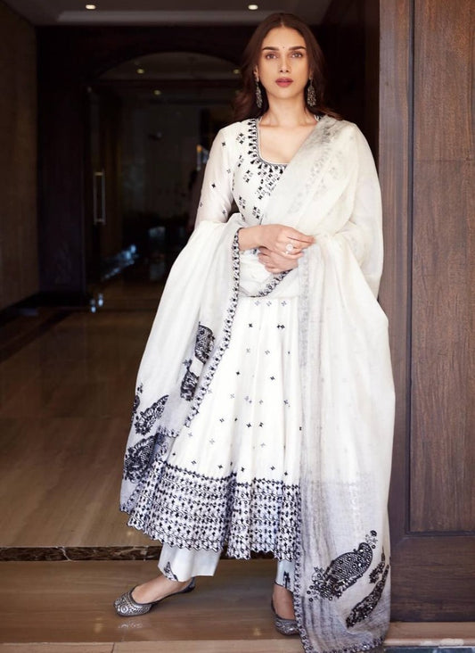 White heavy embroidery work anarkali suit