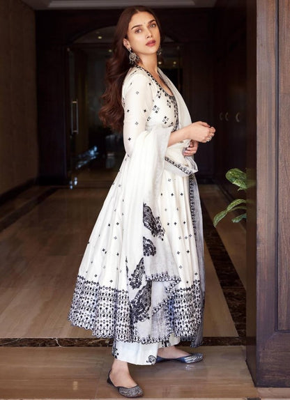 White heavy embroidery work anarkali suit