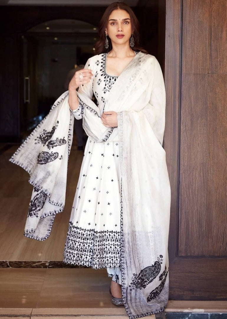 White heavy embroidery work anarkali suit