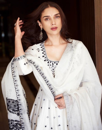 White heavy embroidery work anarkali suit