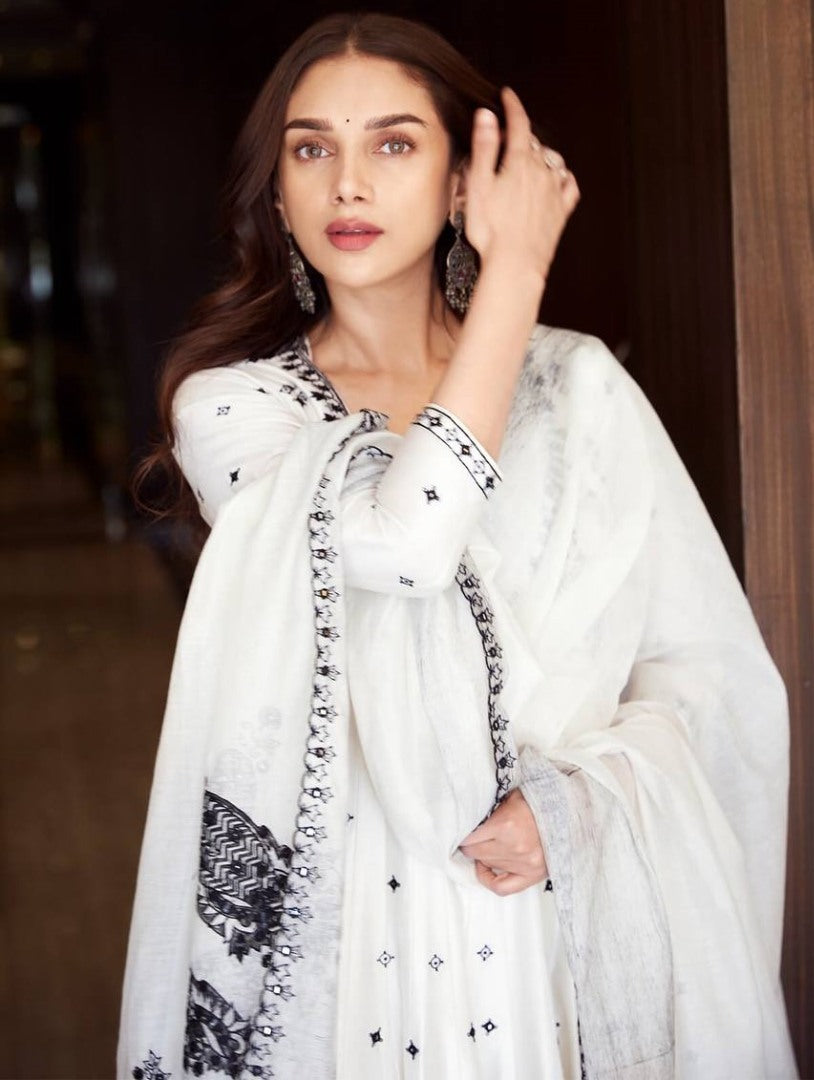 White heavy embroidery work anarkali suit