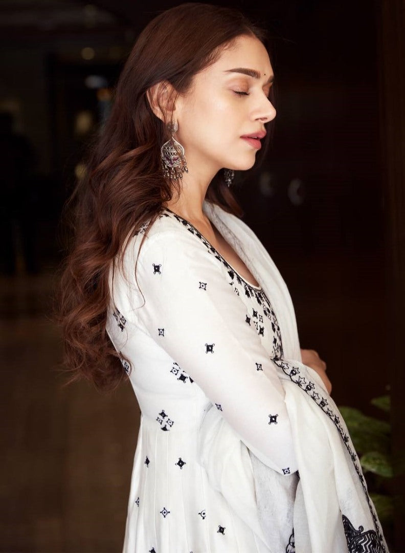 White heavy embroidery work anarkali suit