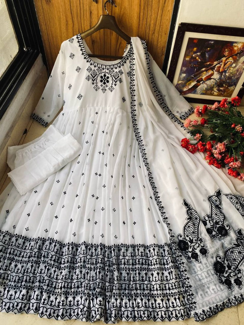 White heavy embroidery work anarkali suit