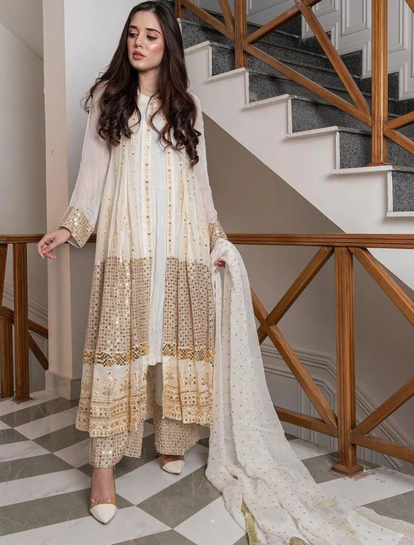 White heavy embroidery worked salwar suit with shrug