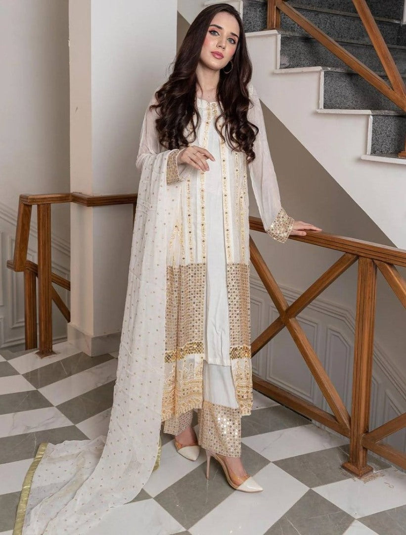 White heavy embroidery worked salwar suit with shrug