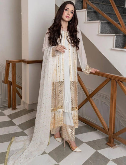 White heavy embroidery worked salwar suit with shrug