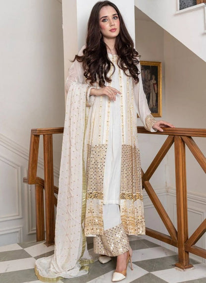 White heavy embroidery worked salwar suit with shrug