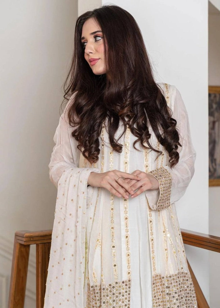 White heavy embroidery worked salwar suit with shrug