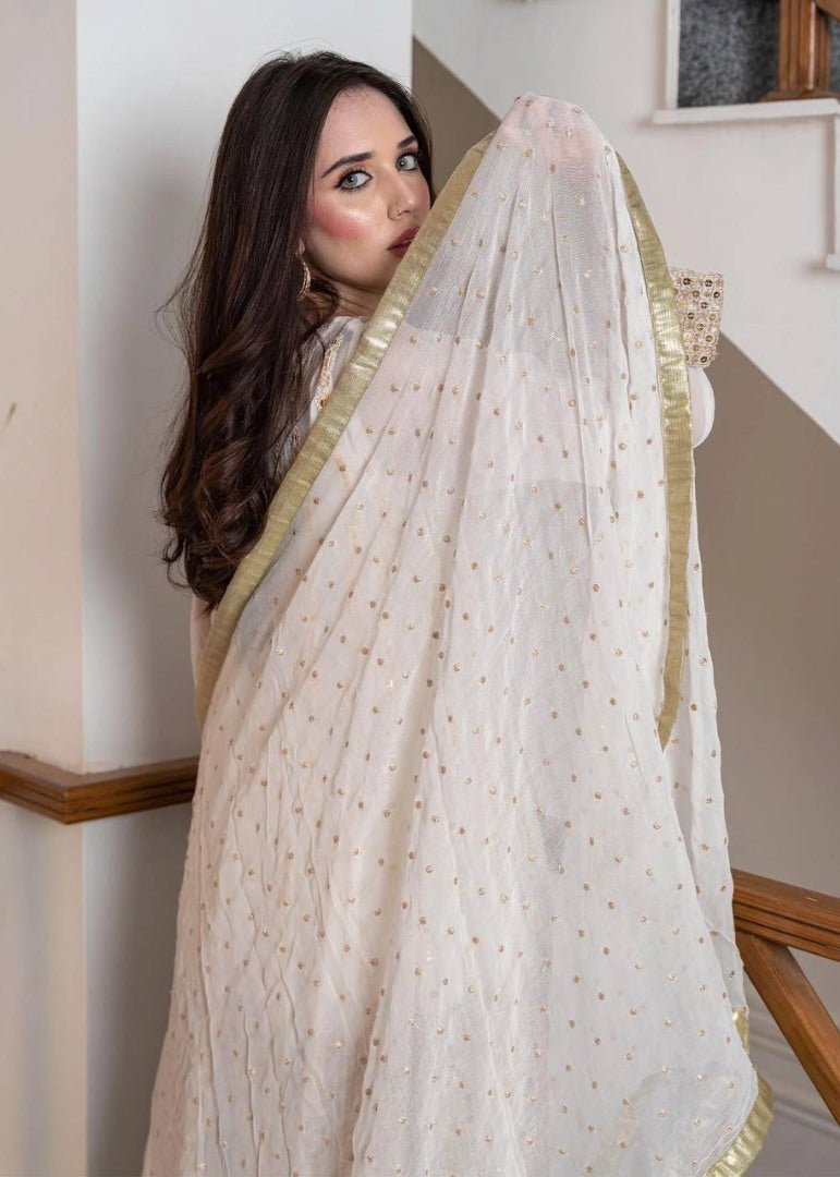 White heavy embroidery worked salwar suit with shrug