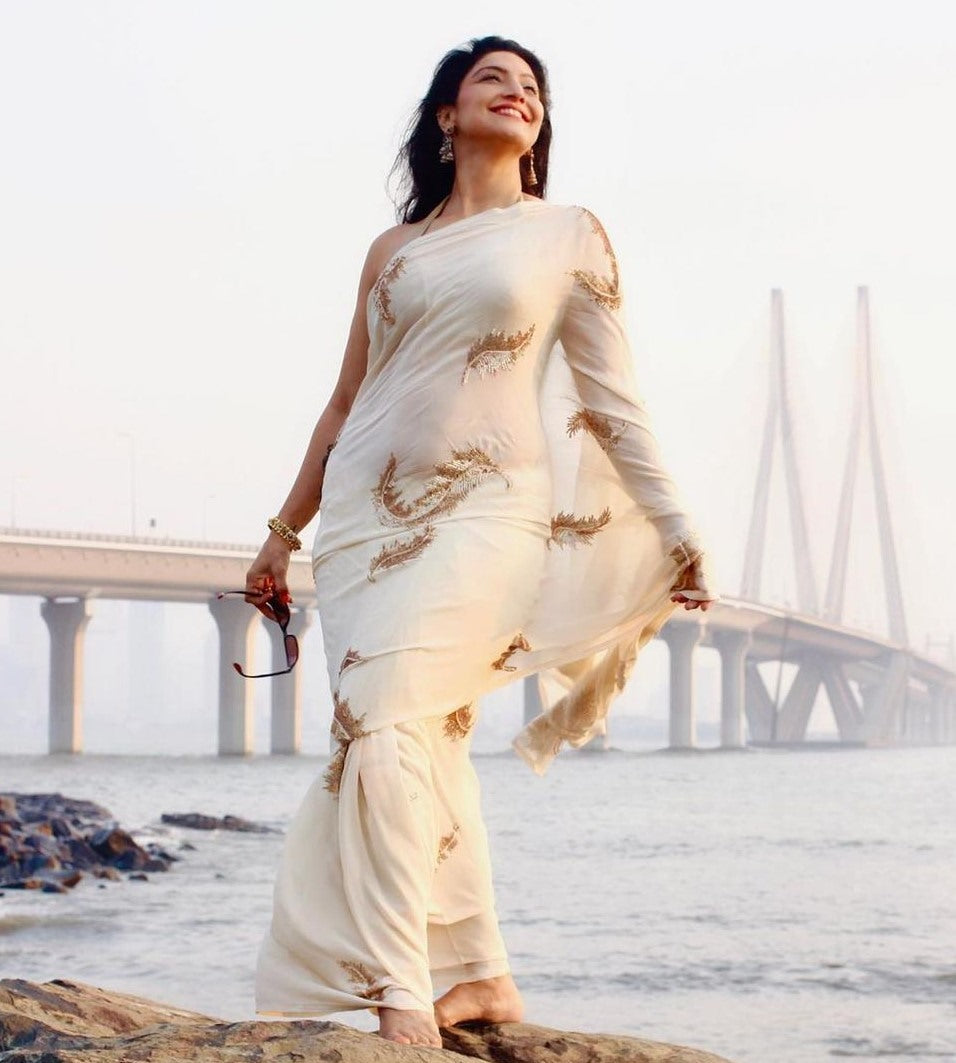 White heavy soft georgette sequence work saree