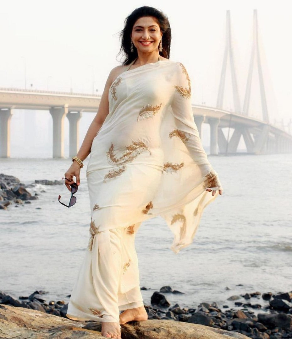 White heavy soft georgette sequence work saree