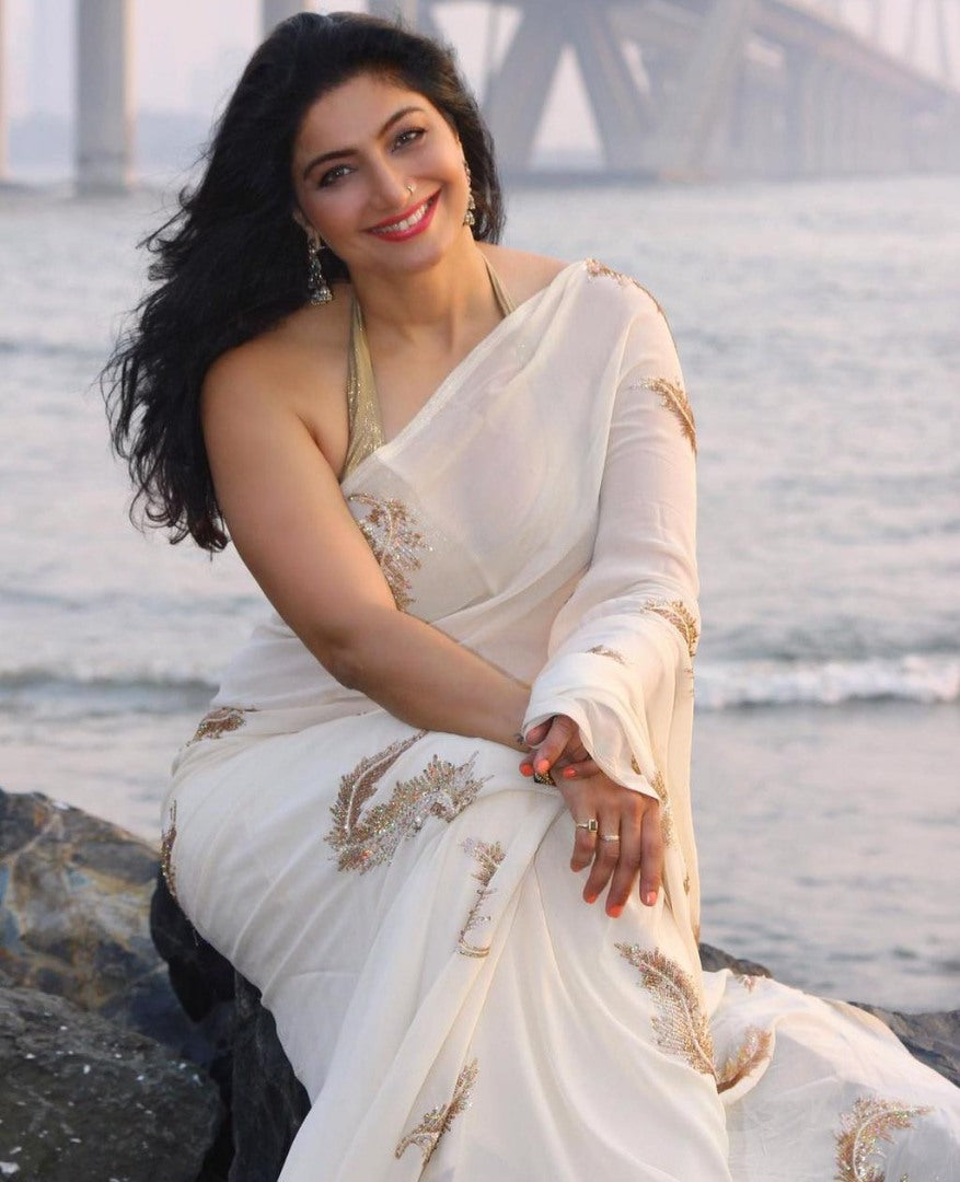 White heavy soft georgette sequence work saree