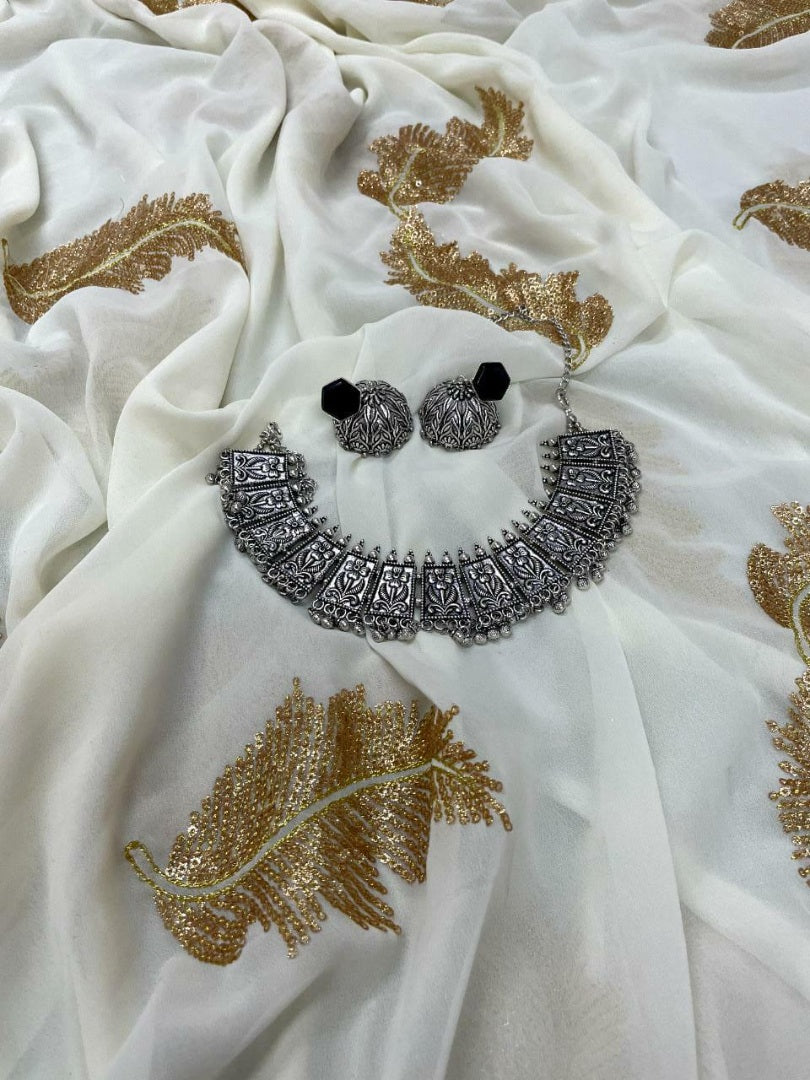 White heavy soft georgette sequence work saree